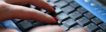 Person doing data entry with keyboard